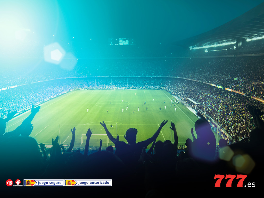 aficionados animando a su equipo de fútbol